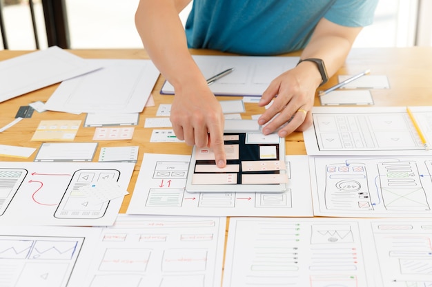 Graphic designers working with UX UI