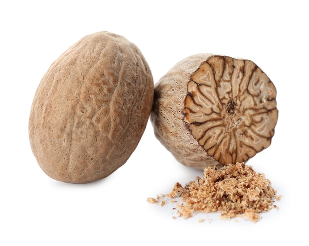 Grated nutmeg and seeds isolated on white