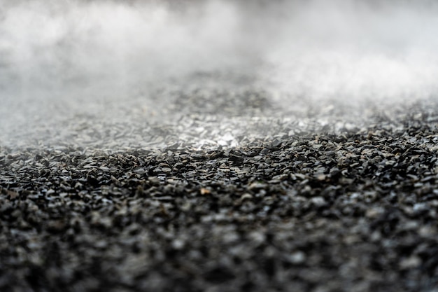 gravel texture floor with mist or fog Light dark and gray abstract gravel texture for display products Selective focus