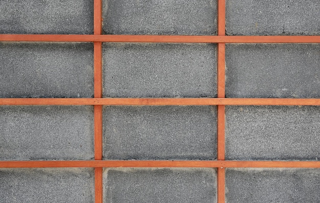 Gray block wall with wood square grid japanese style as background