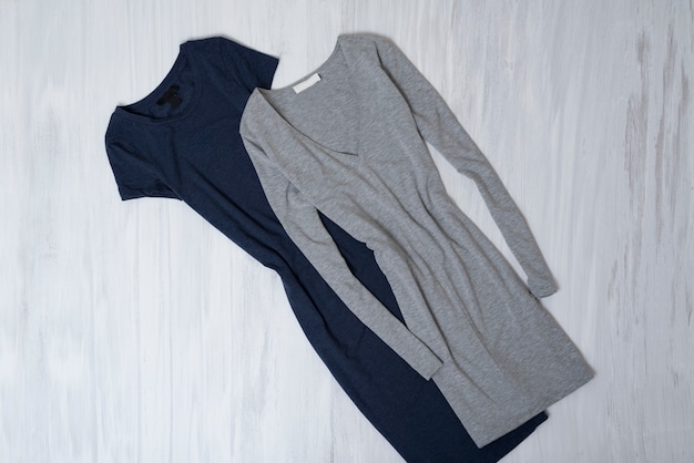 Gray and blue dresses with sleeves. Fashionable concept