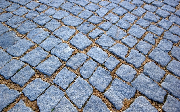 Gray cobbled road as background