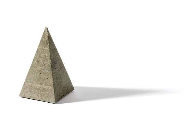 Gray concrete pyramid shaped sculpture