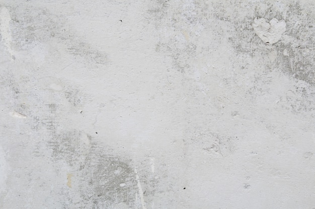 Gray concrete wall peeled wallpaper. Concrete background.