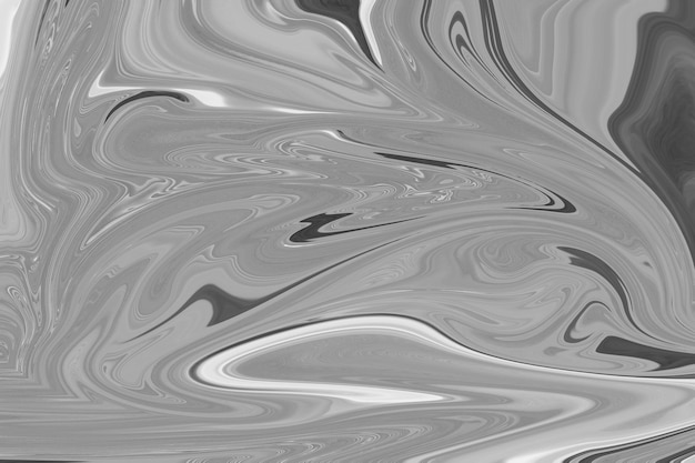 Gray fluid art marbling paint textured background