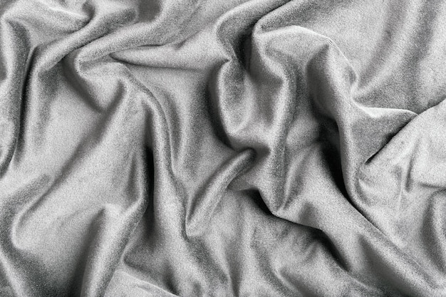 Gray folded velvet fabric as a background