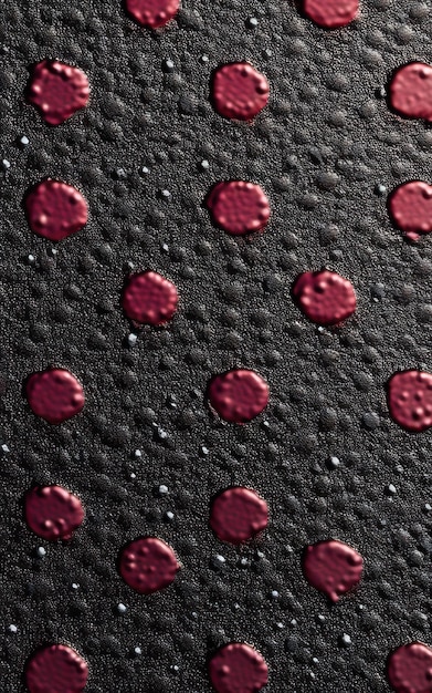 Photo gray and maroon colored dotted texture