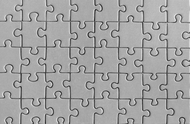 Gray puzzle pattern background top view