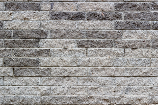 Gray stone bricks wall texture. Abstract stone brick background