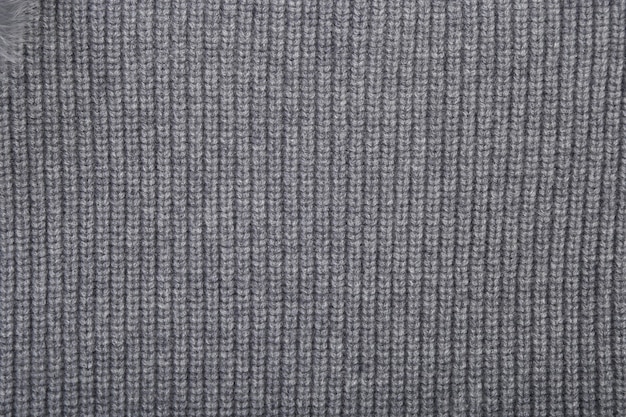 Gray texture wool close-up, woven cloth, knitted fabric