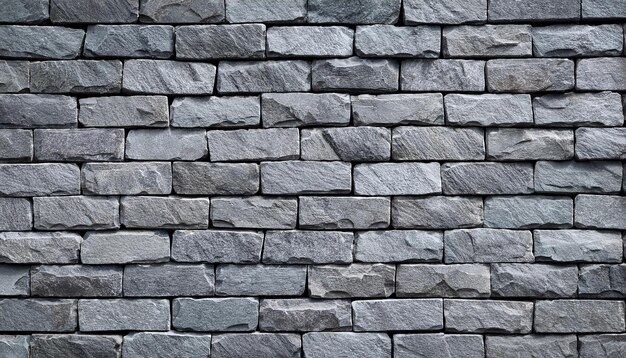 Photo a gray wall with a gray stone wall and a black stone wall