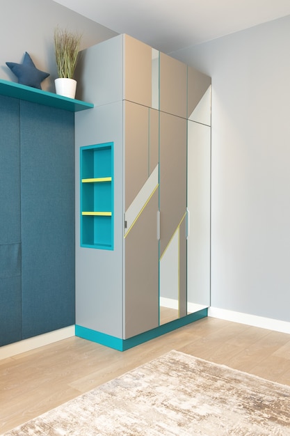 Gray wardrobe with blue shelves and mirrors inside a beautiful decorated room