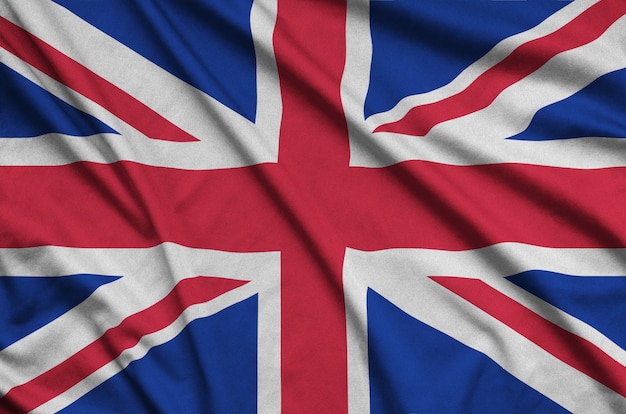 Great britain flag  is depicted on a sports cloth fabric with many folds.