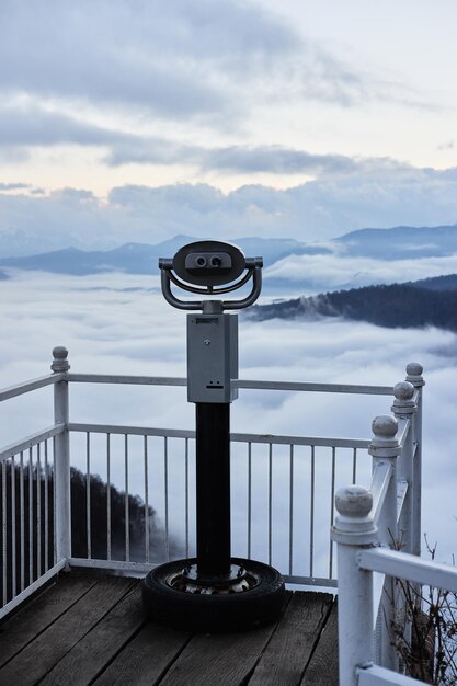 Great Caucasus Mountains of reserve and winter forest in fog