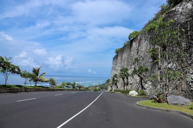 A great highway to the beach with blue sea landscape and cliff