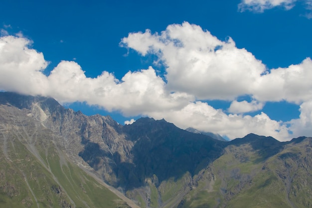 Great mountain peak with clouds