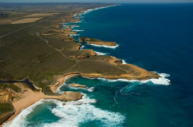 Great Ocean Road helicopter flight over the cliffs and coastal landscape next to the Twelve Apostle