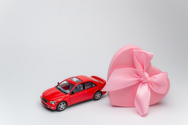 Photo great present for a lady on th march concept photo trendy car driving from open unpacked unwrapped