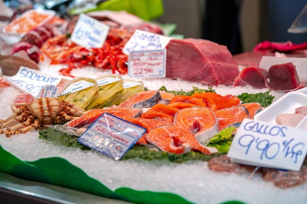 Great quantity of fresh seafood on fish market in Barcelona Spain