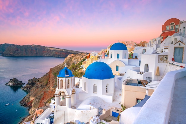 Great twilight view of Santorini island. Sunset on the famous Oia city, Greece, Europe