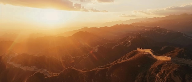 Photo the great wall of china glows under the setting sunis rays weaving through rugged mountains creating a serene and aweinspiring scene