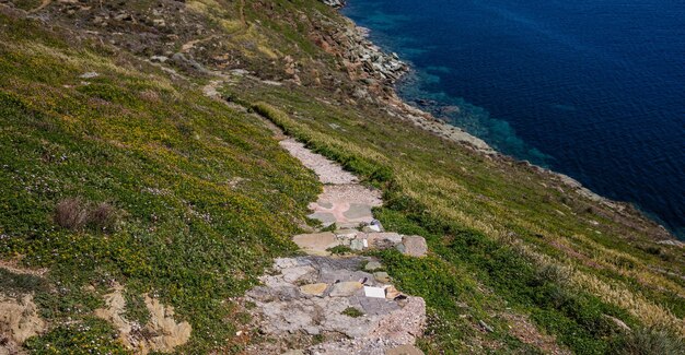 Greece Kea island Pathway landscape in springtime and blue sea water