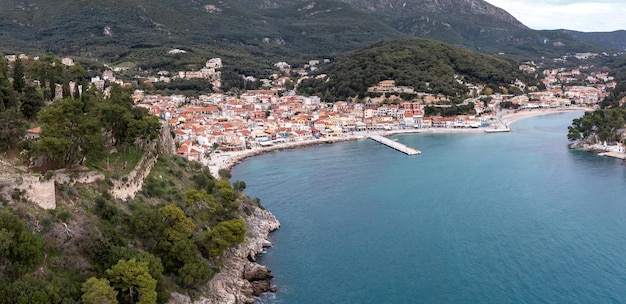 Greece Parga Epirus Aerial drone view of coastal Ionian city traditional building nature background