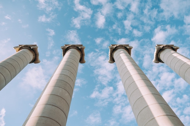 Greek columns at the sky background.