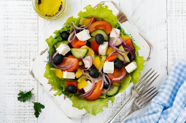 Greek salad in a ceramic plate