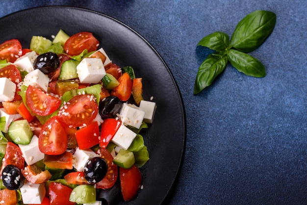 Greek salad with fresh vegetables feta cheese and black olives