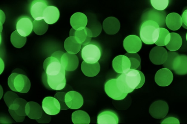 Green abstract Christmas blurred luminous background