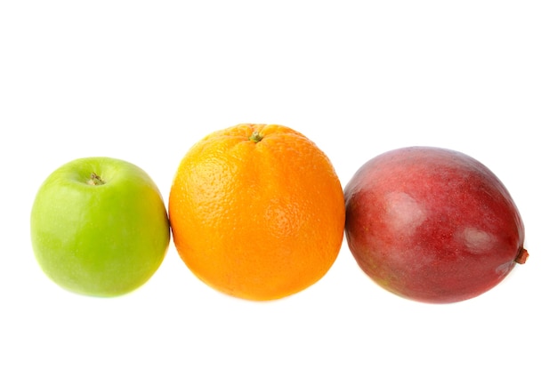 Green apple orange and  mango isolated on white background