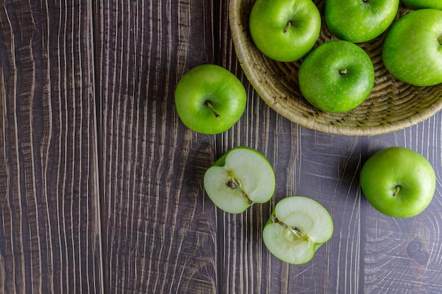 Green apples in a basket