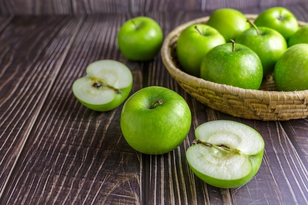 Green apples in a basket