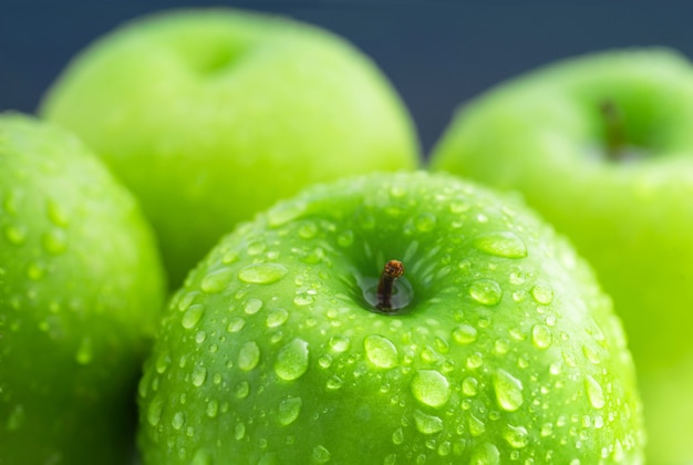 Green apples composition with water drop