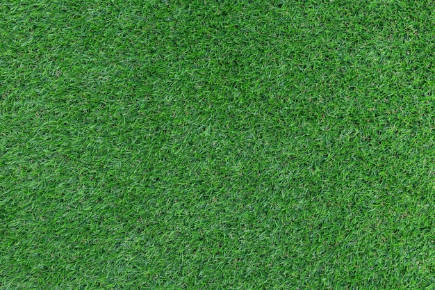 Green artificial grass pattern and texture background