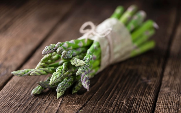 Green Asparagus closeup shot on wood