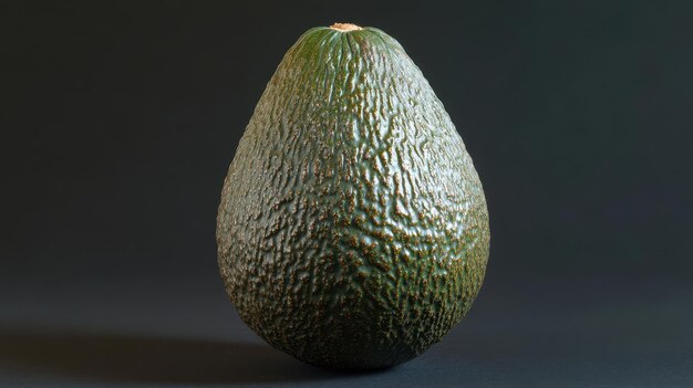 Photo a green avocado with a green center and a dark background