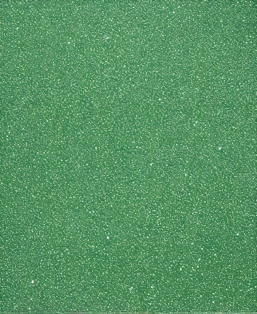 a green background with a white speckled speckled speckled pattern