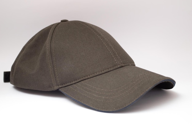 Green baseball cap on a white background.