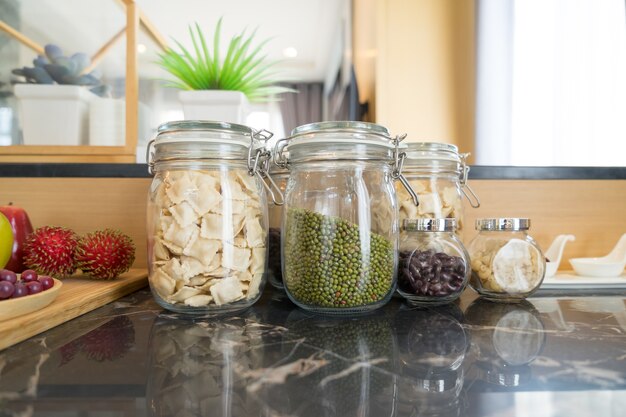 Photo green bean, red bean, macaroni, pasta in glass jar.