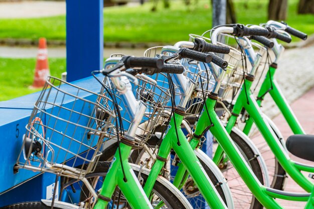 Green bicycles in a row Sustainable urban mobility