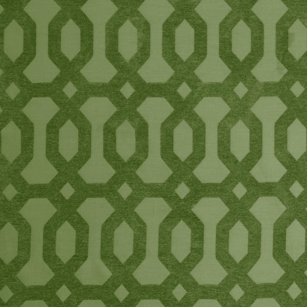 A green and black fabric with a pattern of circles and lines