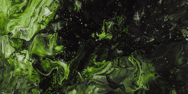 A green and black painting with the words " green " on the bottom.