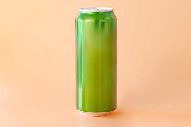 A green blank aluminum can of beer stands on an orange background Mark Advertising Advertise Drinking Dairy Distillery Factory Drinker Production