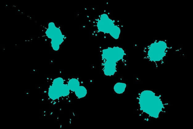 Green blot on a black background Spots of paint on a piece of paper