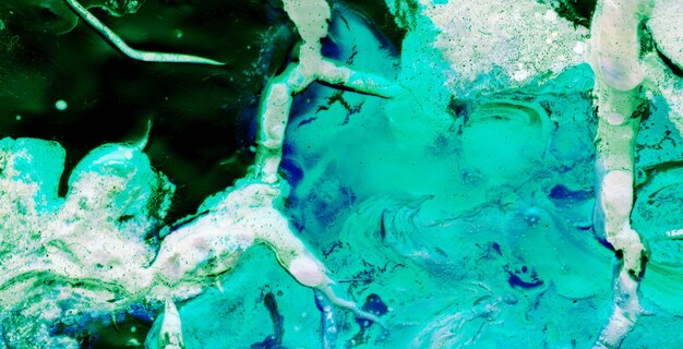 A green and blue image of a body of water with a blue and green color.