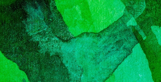 a green and blue textured background with a green texture