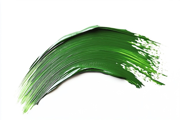 Photo a green brush stroke with paint isolated on a white background