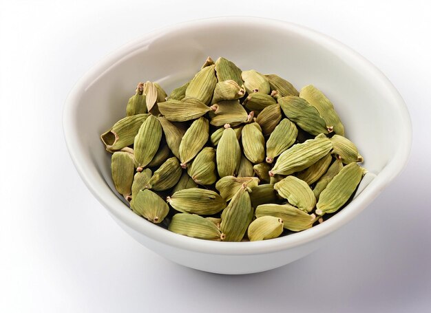 Green cardamom pods in a White bowl isolated on white background generative ai